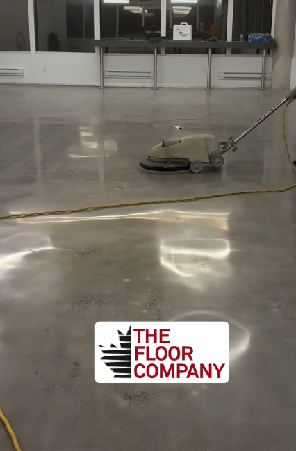 Burnishing a polished concrete slab in a commercial kitchen