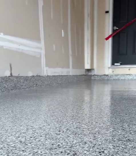 Grey flake epoxy entry floor, new build